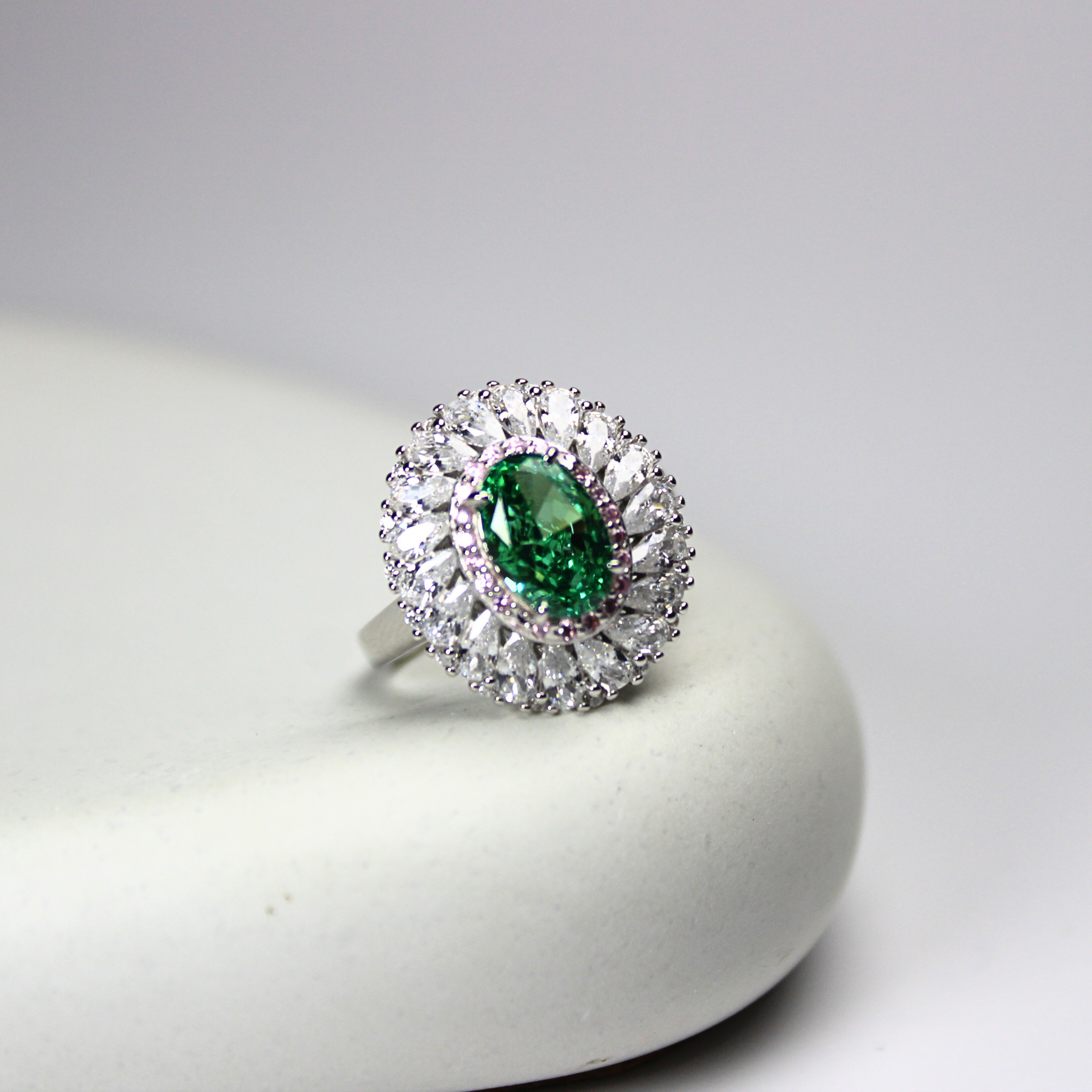MintRose adjustable ring in 92.5 sterling silver with a mint-green gemstone and rose gold accents. Tarnish-free, hypoallergenic, and perfect for sensitive skin—elegant, durable, and timeless.